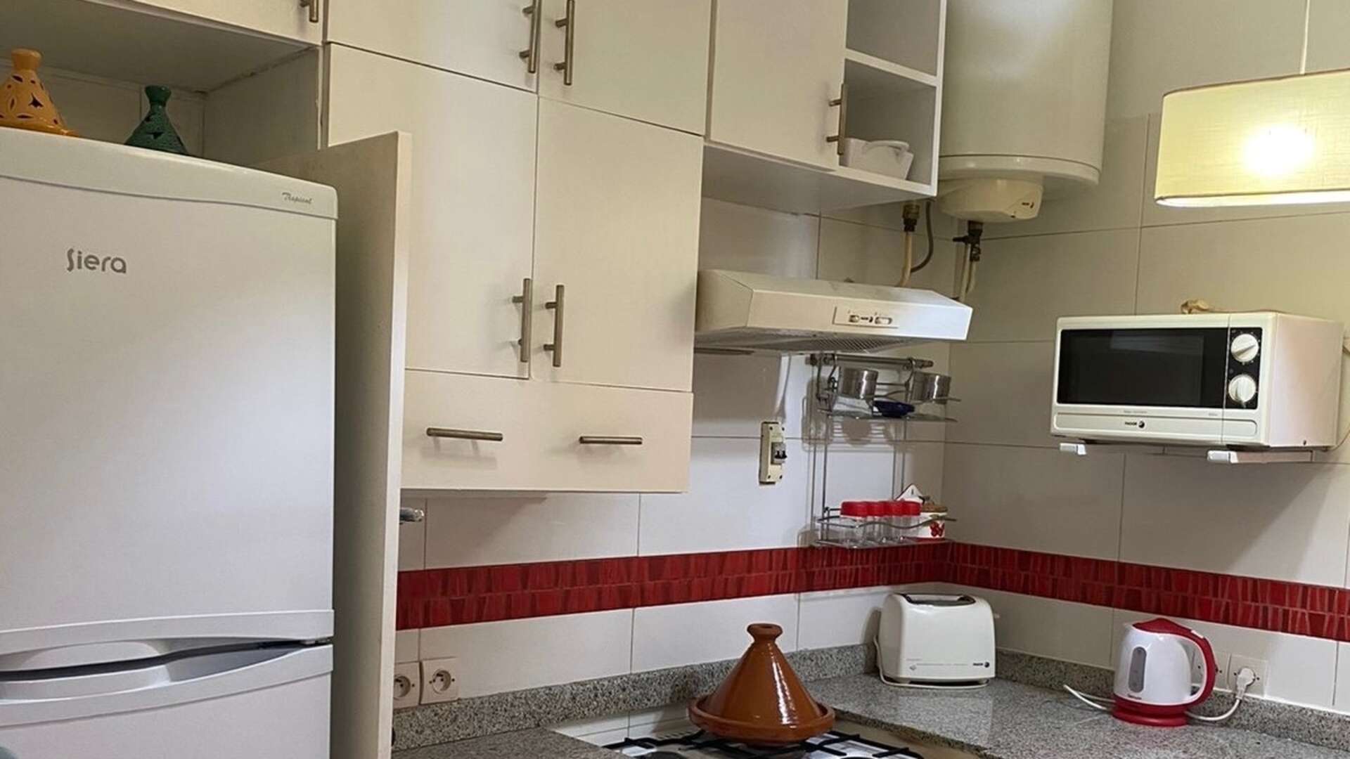 Location longue durée ,Appartement,Appartement moderne meublé avec goût situé sur grand boulevard sans vis-à-vis dans un immeuble calme,Marrakech,Hay Charaf